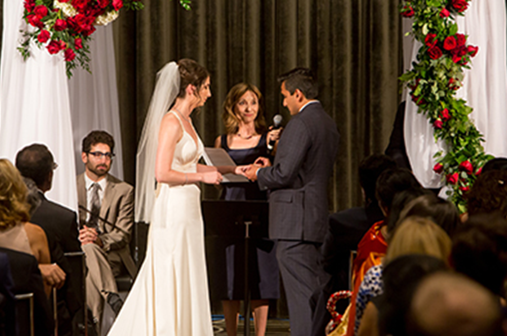 Couple saying their vows at alter